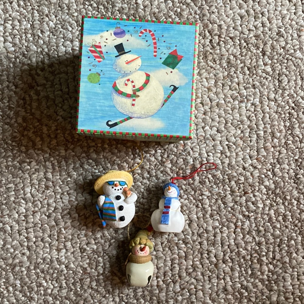 Three snowman ornaments